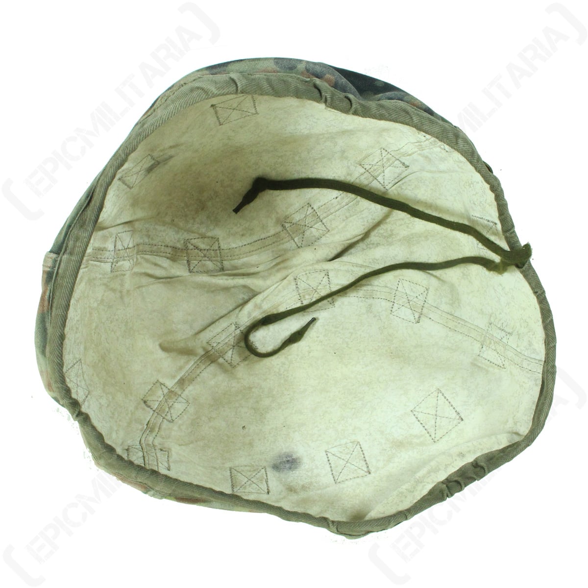 Internal view of the genuine German Army helmet cover showing the off-white snowy side, adjustable drawstrings, and reinforced stitching for the foliage loops.