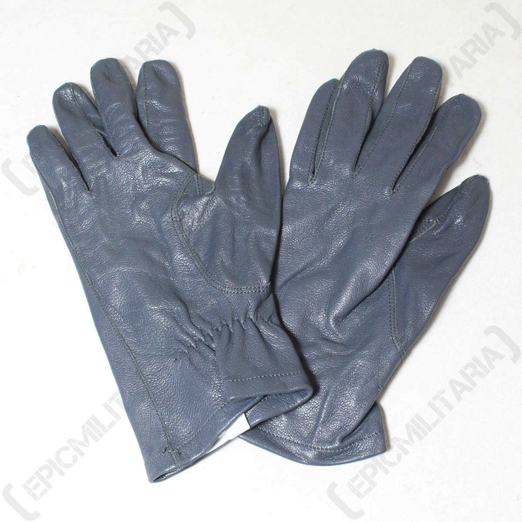Two German Army leather gloves placed side by side, showcasing their robust, hard-wearing design and authentic surplus condition.