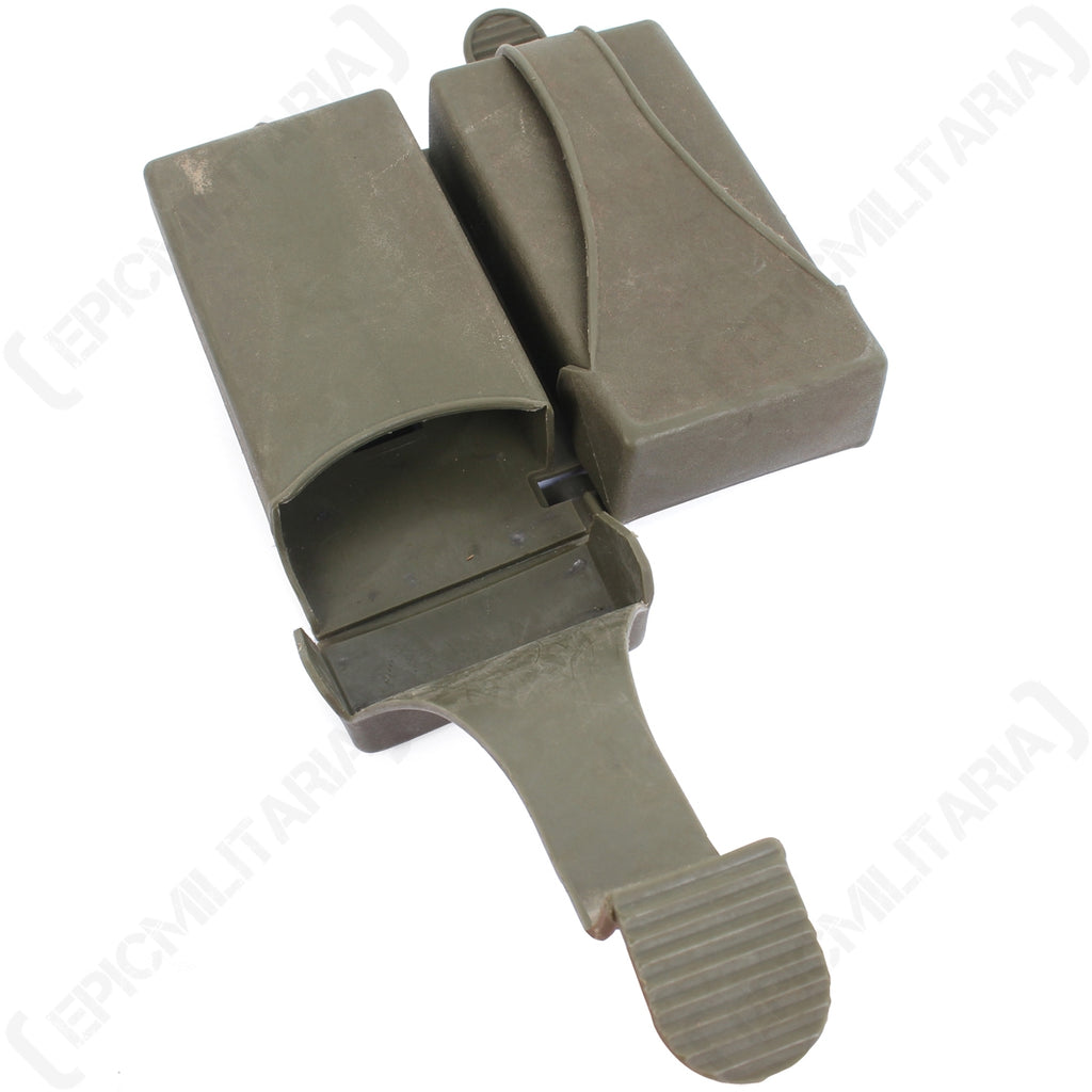 Detail view of a German G3 military surplus pouch with one compartment open, displaying the interior storage space and clasp mechanism.