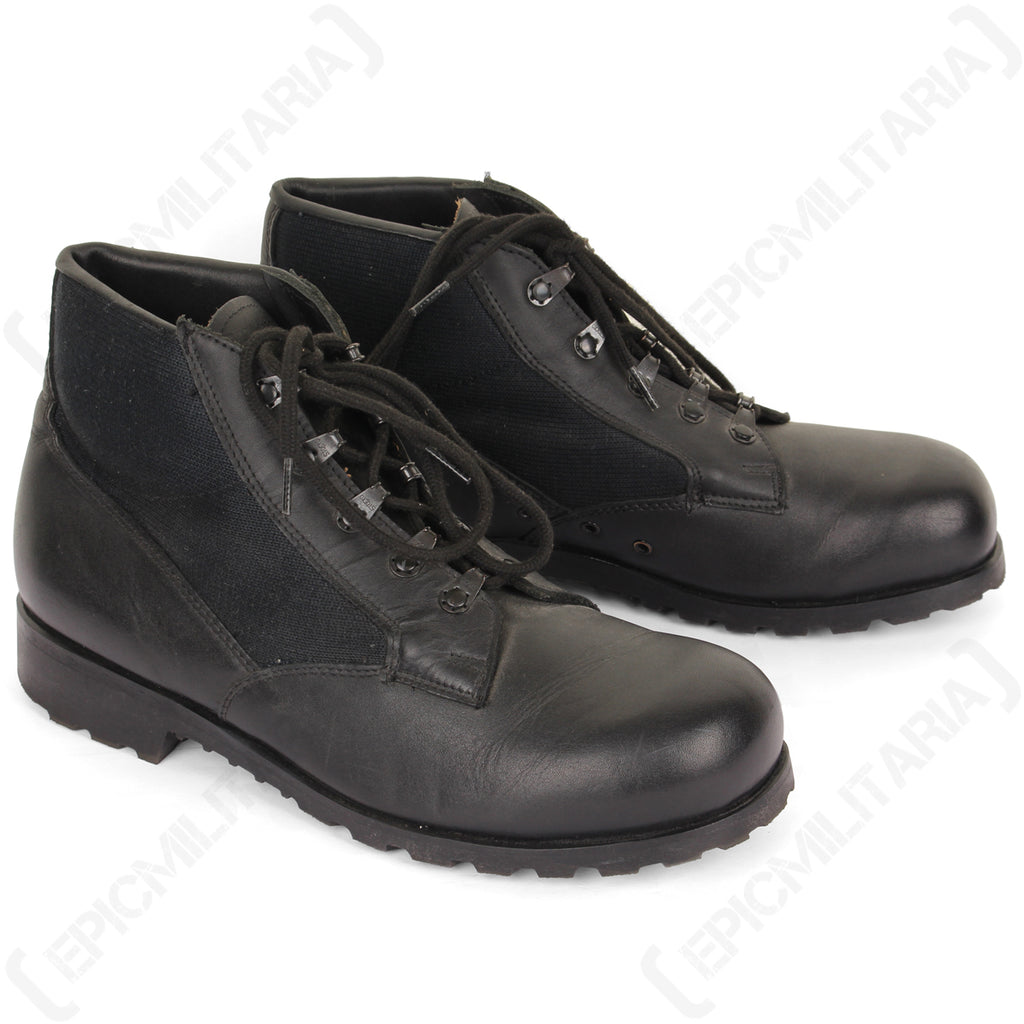 Pair of genuine German Navy deck shoes, showcasing the black leather and canvas construction with sturdy lace-up closure.
