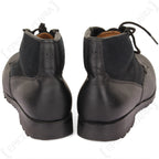 Rear view of two German Navy deck boots, emphasizing the high-top ankle support and sturdy, stable 3cm rubber heels.