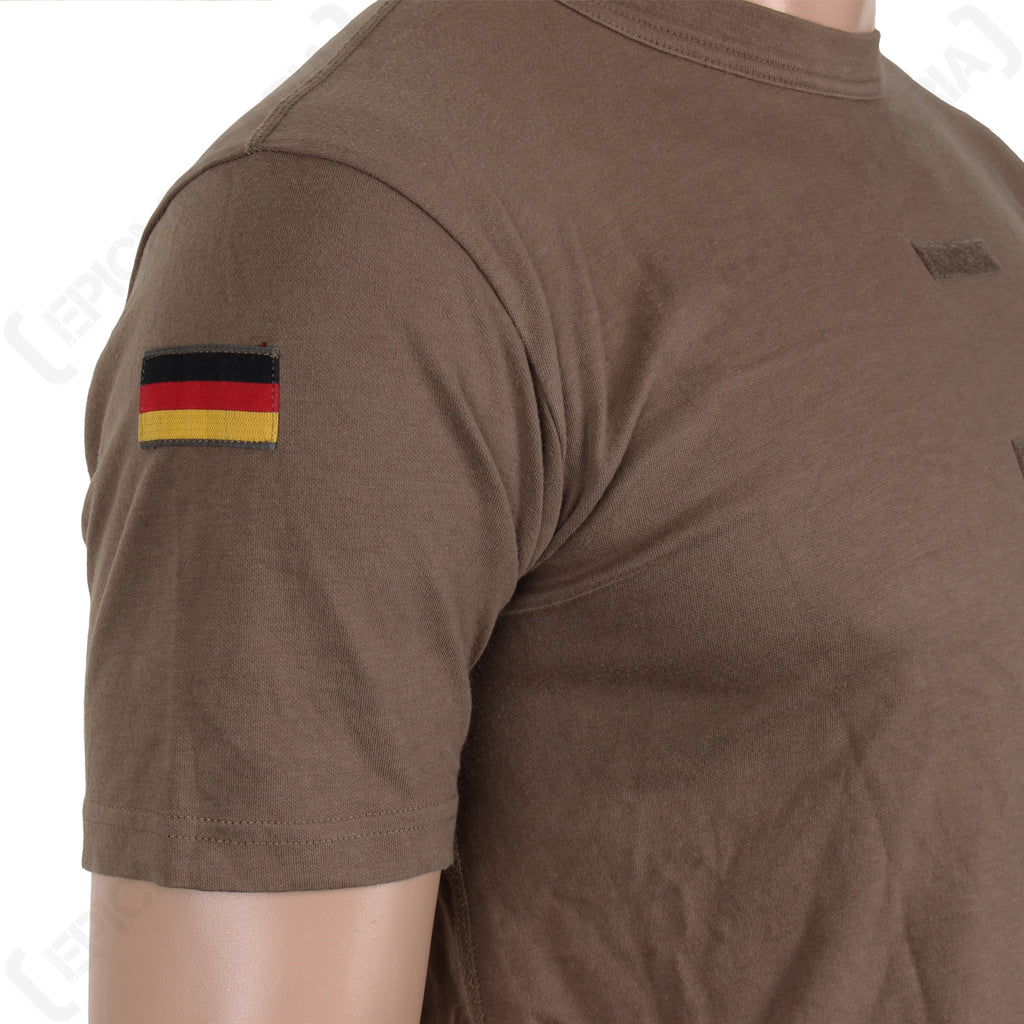 Close-up side profile of the German military t-shirt displaying a German flag patch sewn onto the sleeve.