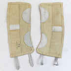 Pair of original Italian Army gaiters showing inner khaki cotton canvas with grey leather reinforcement patches and foot straps.