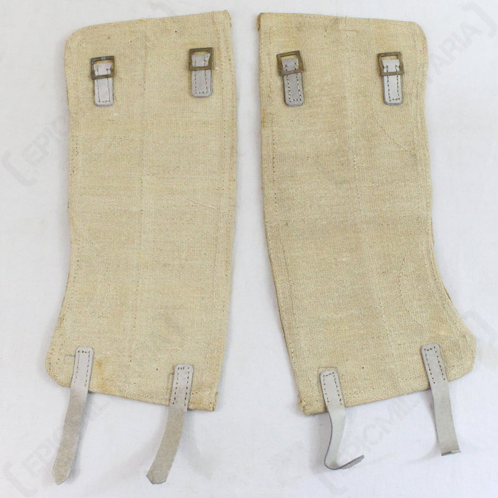 Reverse side of Italian Army canvas gaiters displaying metal buckles for secure adjustable fit and bottom leather attachment hooks.