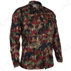 Three-quarter view of the Swiss M83 Alpenflage military jacket showing the robust cotton blend fabric, classic collar, and structured fit typical of authentic surplus gear.