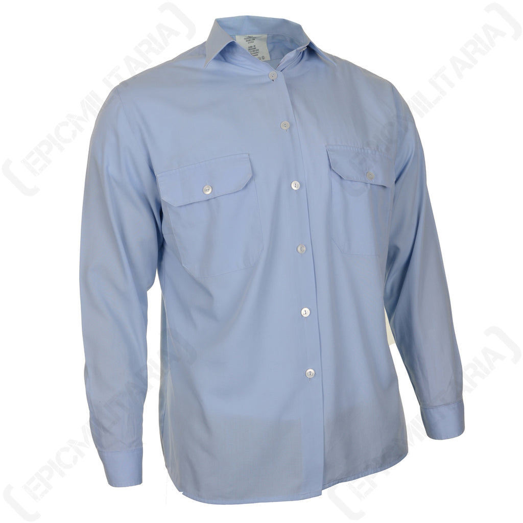 Three-quarter angle of a German light blue military service shirt highlighting the collar, buttoned cuffs, and polyester cotton blend texture.