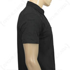 Side view of the black tactical shirt demonstrating the arm sleeve pocket for small gear storage.
