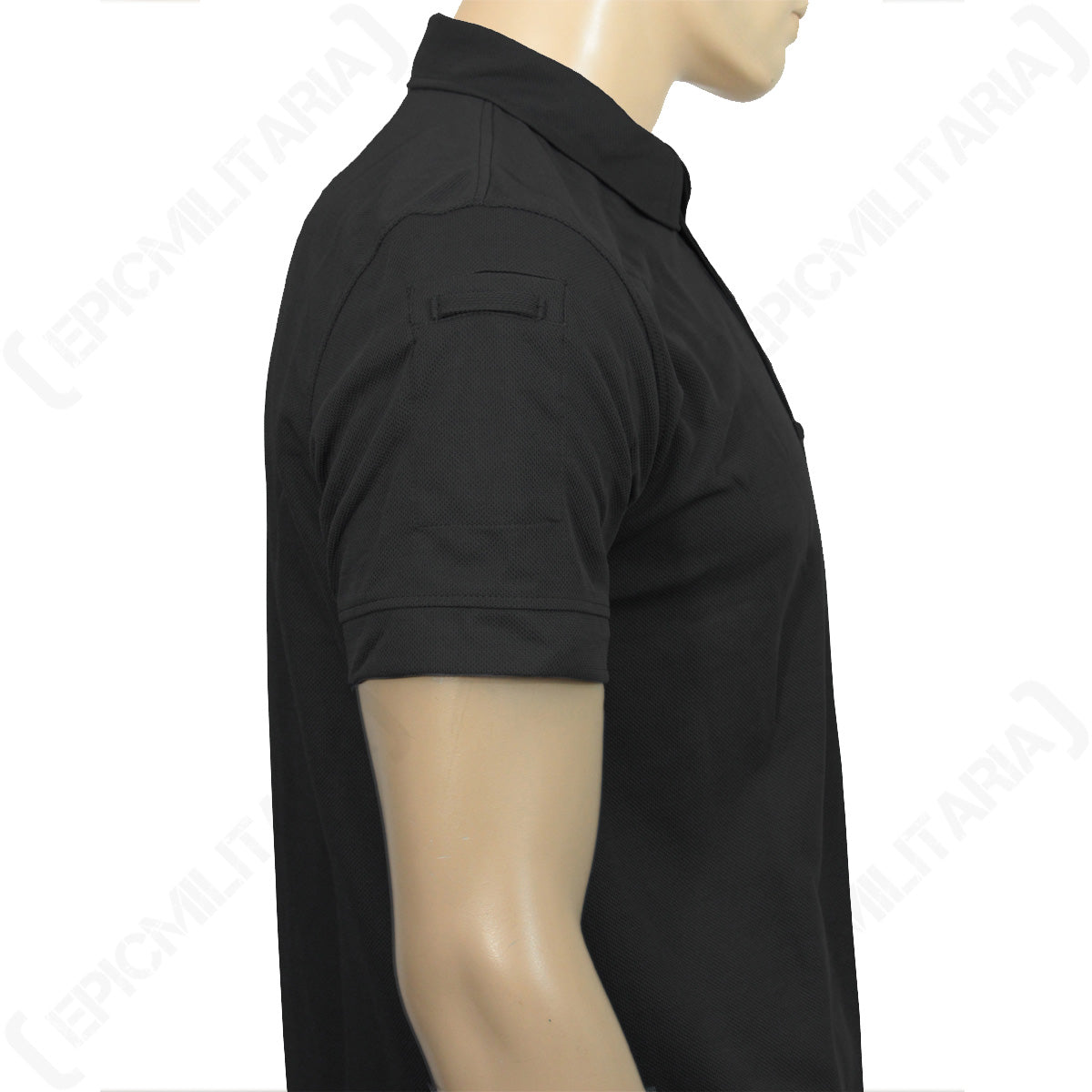 Side view of the black tactical shirt demonstrating the arm sleeve pocket for small gear storage.