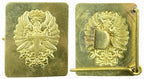 Front and reverse view of the Spanish military eagle brass buckle, showing the embossed emblem and the integrated sizing pin mechanism.