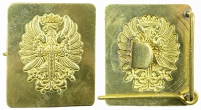 Front and reverse view of the Spanish military eagle brass buckle, showing the embossed emblem and the integrated sizing pin mechanism.