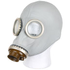 Front-left angle of an authentic grey Soviet GP-5 gas mask featuring circular glass eyepieces and a threaded brown filter port.