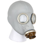 Side profile of the Soviet GP-5 gas mask on a display head, showcasing the durable grey rubber material and circular eyepiece.