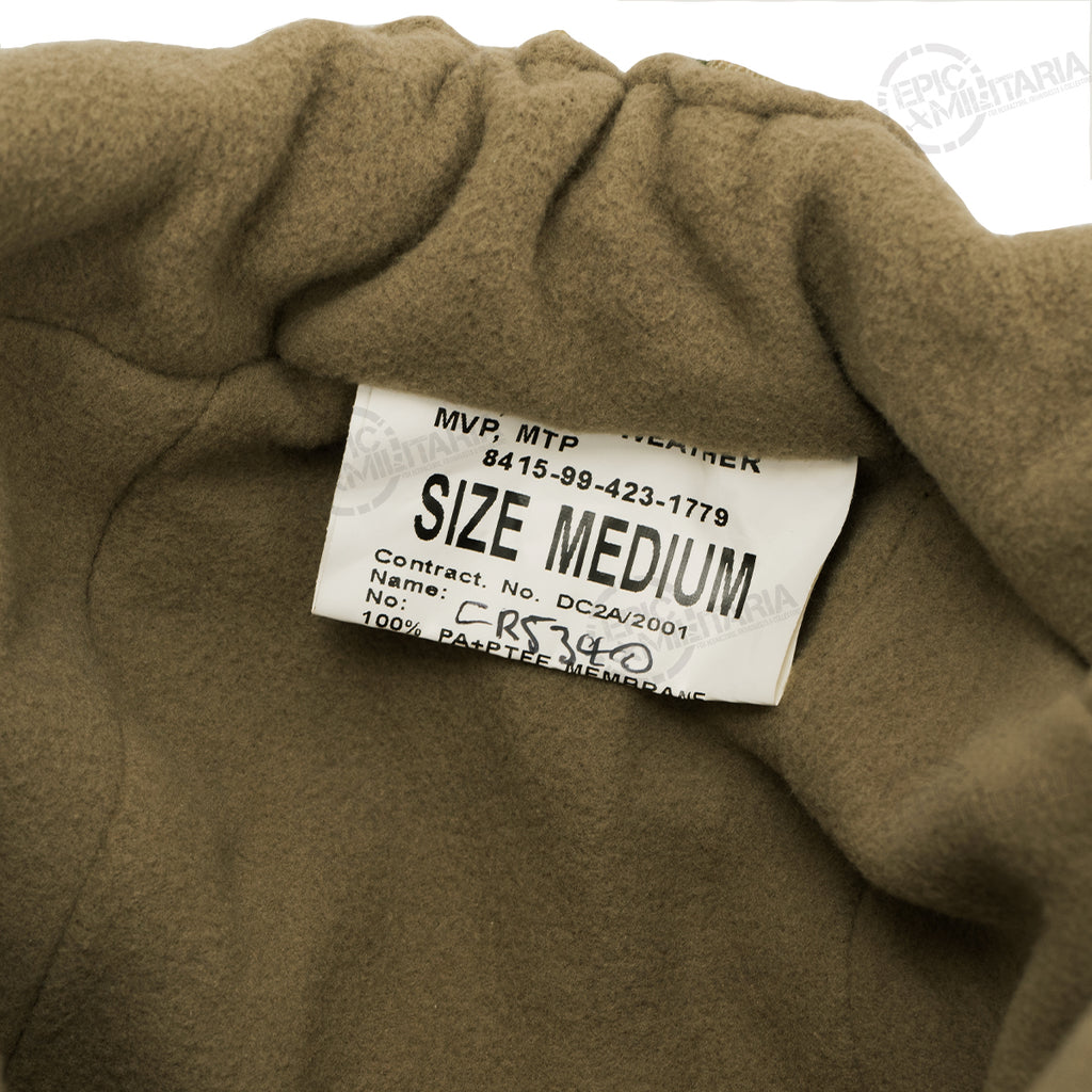 Interior view of the British Army MTP winter hat focusing on the soft fleece lining and original issue size tag.