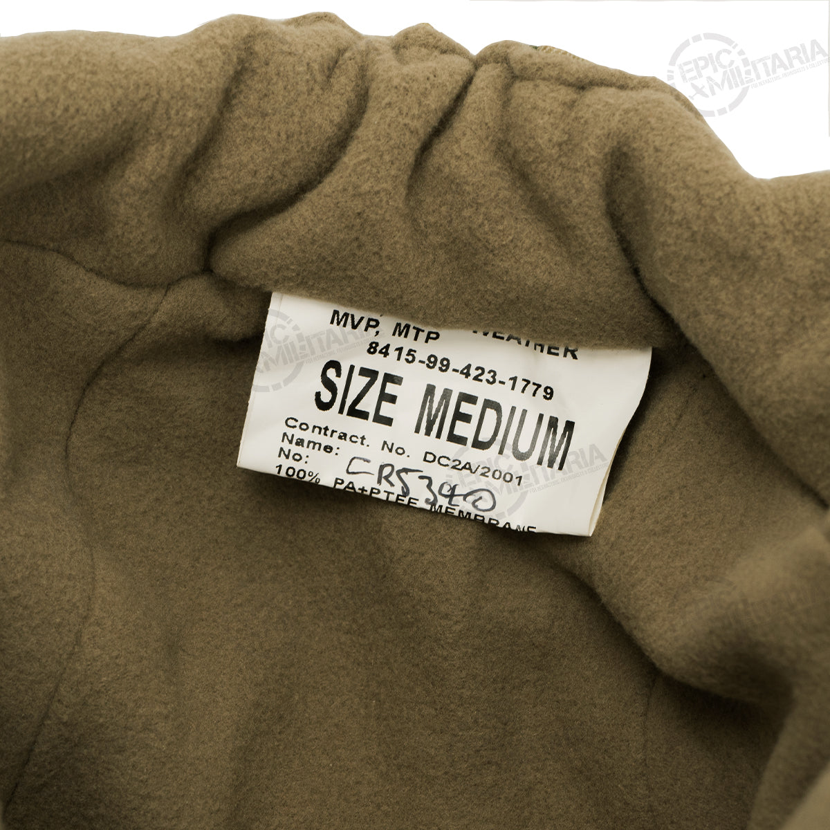 Interior view of the British Army MTP winter hat focusing on the soft fleece lining and original issue size tag.