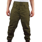 Front view of surplus Czech army combat over-trousers in olive green, showing the robust waistband and large cargo pockets for field utility.
