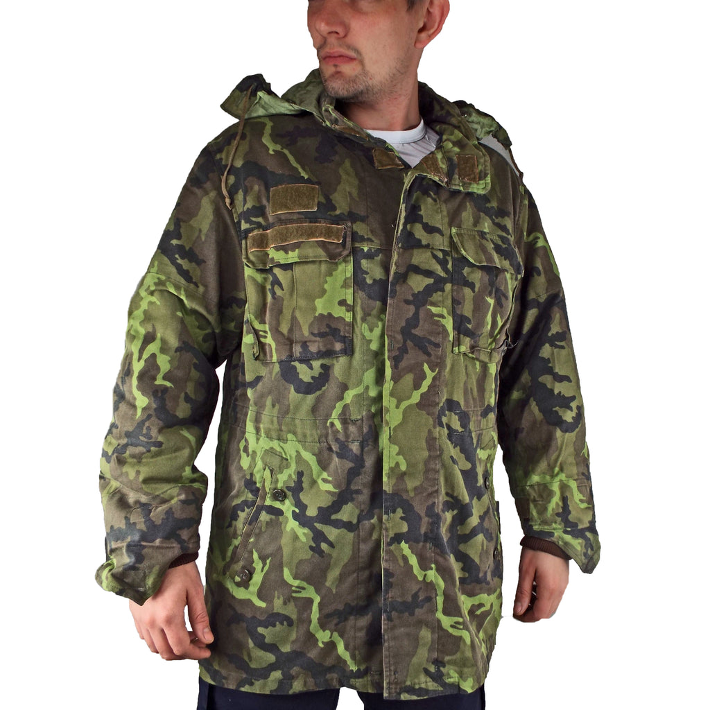 Front angle of the original Czech Army M95 parka featuring a buttoned storm flap and durable poly-cotton material.