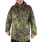 Model wearing a Czech Army M95 camo parka with the classic vz. 95 leaf pattern, front view showing utility pockets.