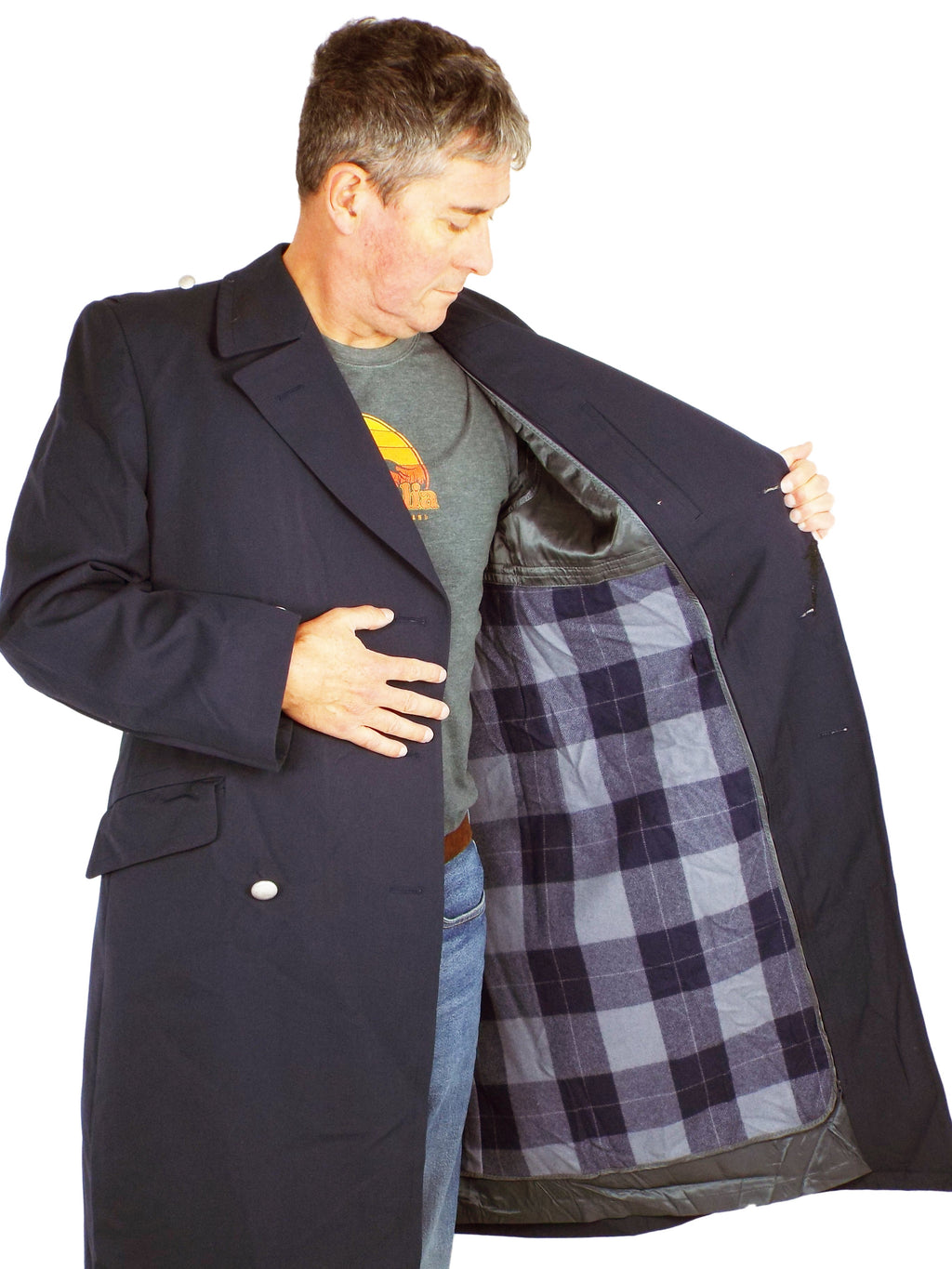 A model showing the interior of the German Navy trench coat, highlighting the removable grey plaid patterned liner inside the dark blue gabardine shell.
