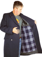 A model showing the interior of the German Navy trench coat, highlighting the removable grey plaid patterned liner inside the dark blue gabardine shell.