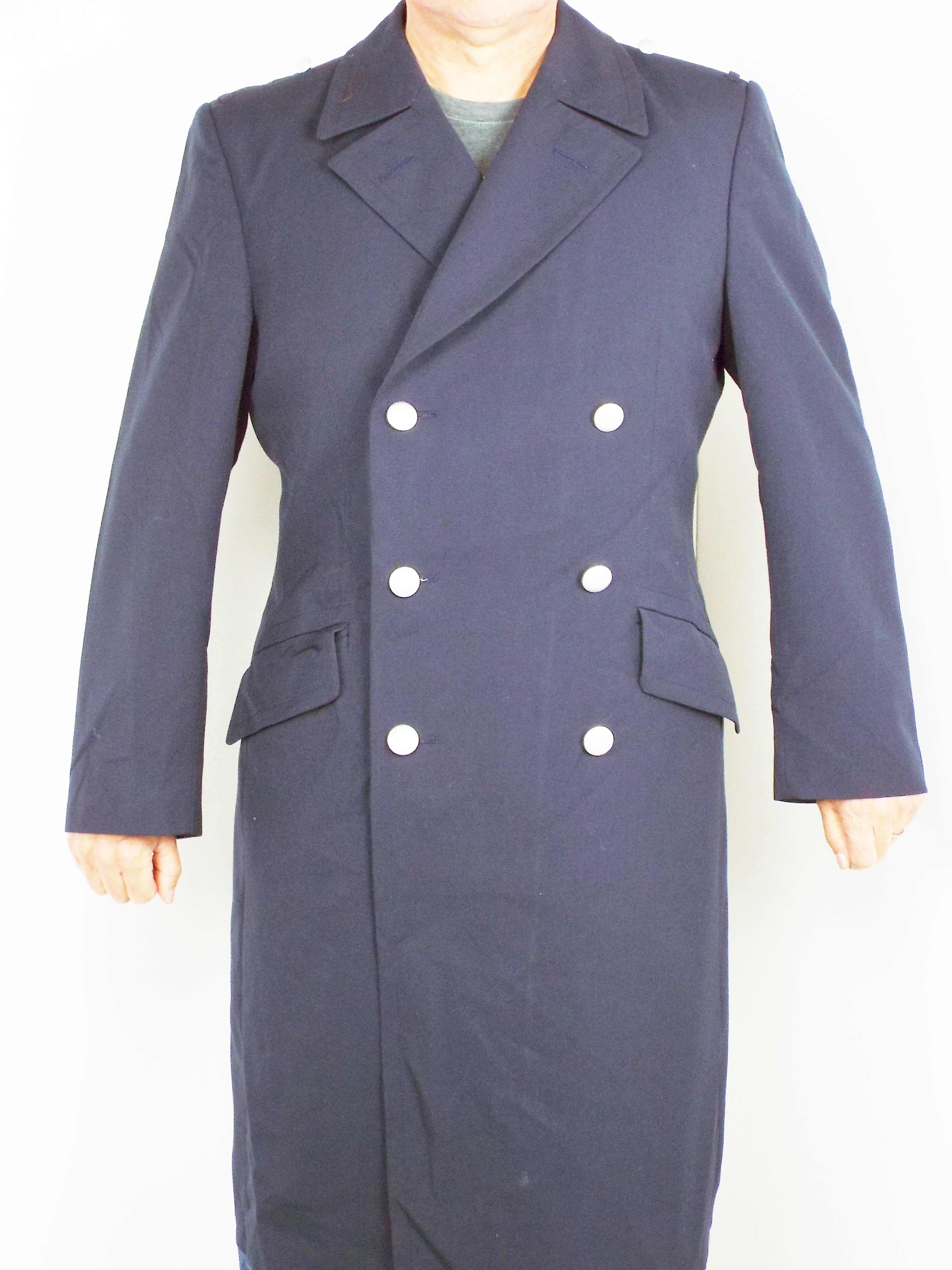 Full-length front view of the German Navy trench coat worn closed, displaying the high-quality dark blue gabardine material and sharp silhouette.