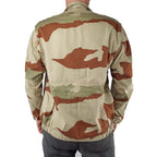 Rear view of the genuine French Army F2 jacket in desert camo, displaying the consistent CCE pattern and structured fit with an elasticated hem.