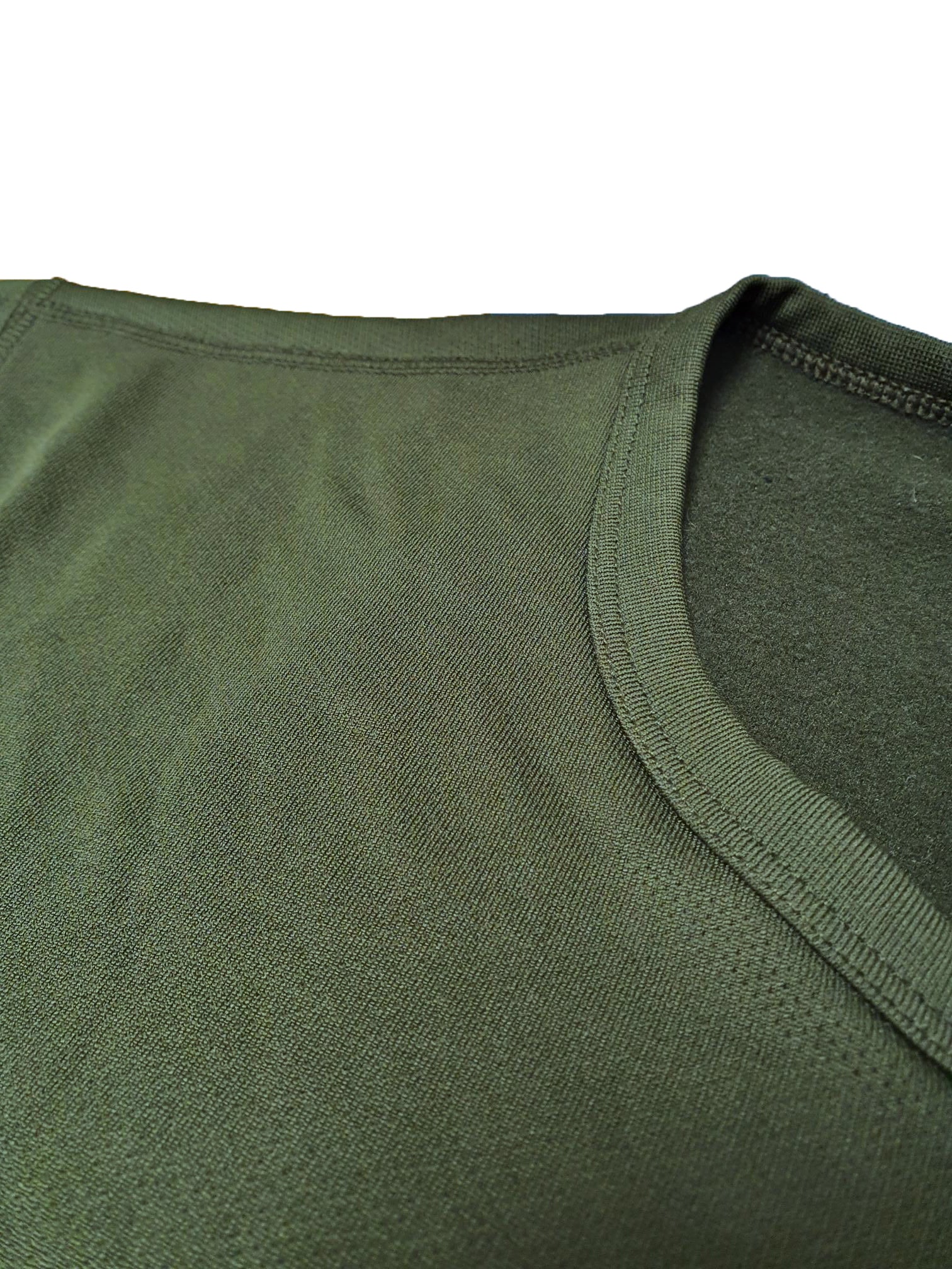 Close-up detail of the thermal shirt neck and fabric, showing the soft, heat-retaining cotton blend texture.