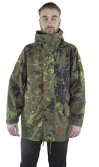 Front view of a genuine Bundeswehr military surplus Flecktarn parka with a large hood, zipper and press stud closure, and multiple storage pockets.