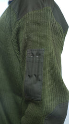 Close-up view of the reinforced pen pocket detail on the sleeve of an unissued Italian military wool sweater, showing durable construction.
