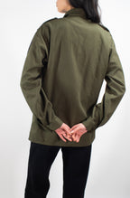Rear view of the Austrian military combat shirt on a model, highlighting the durable stitching and tailored fit of the vintage fabric.
