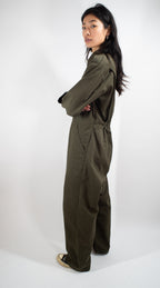 Side view of Dutch Army overalls, highlighting the clean lines, collar, and side pass-through pocket details.