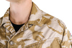 Close-up of the collar and shoulder area on a British military desert camouflage shirt, highlighting the durable stitching.