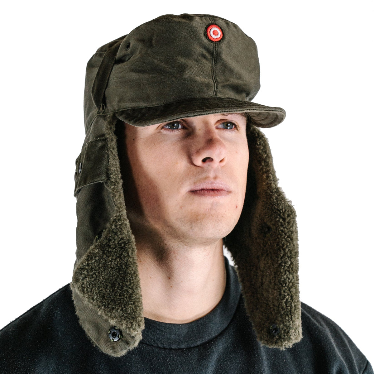 Austrian KAZ 75 alpine cap with plush fleece-lined ear flaps lowered, showing tactical design and cold-weather construction.