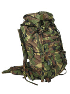 Side profile of 60 litre military rucksack showing durable Cordura nylon, heavy-duty zippers, and camouflage side pouches.