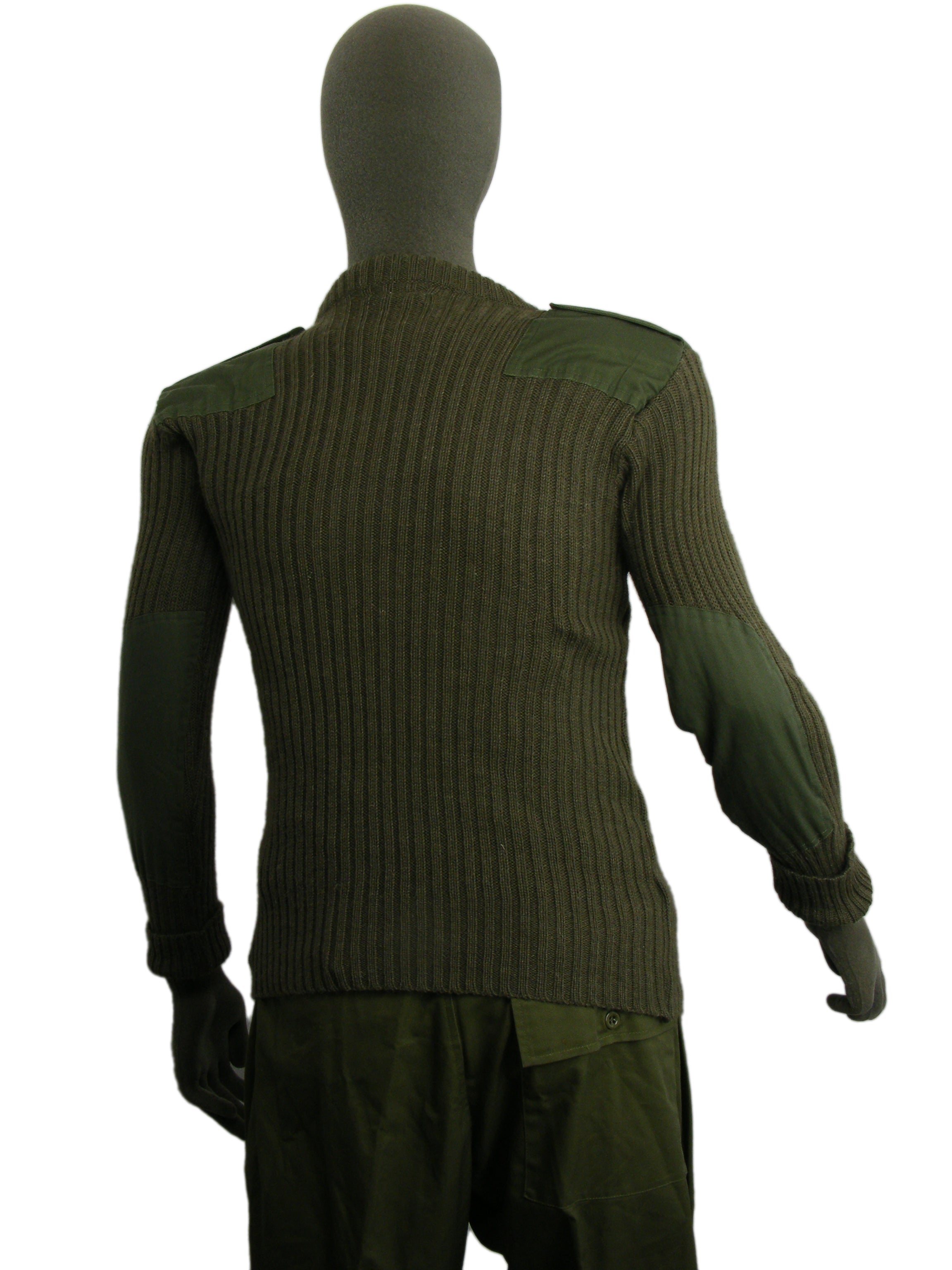 Rear view of the British Army Woolly Pully jumper on a mannequin, showing the full-length heavy ribbed knit construction and shoulder reinforcements.