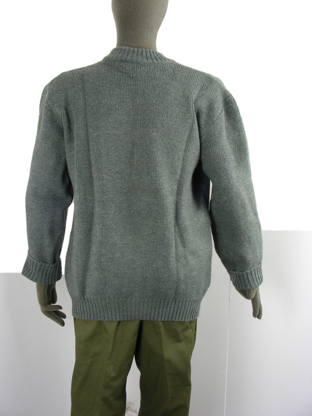 Rear view of a grey Swiss military wool sweater on a mannequin, showcasing the thick, warm knit construction and classic fit.