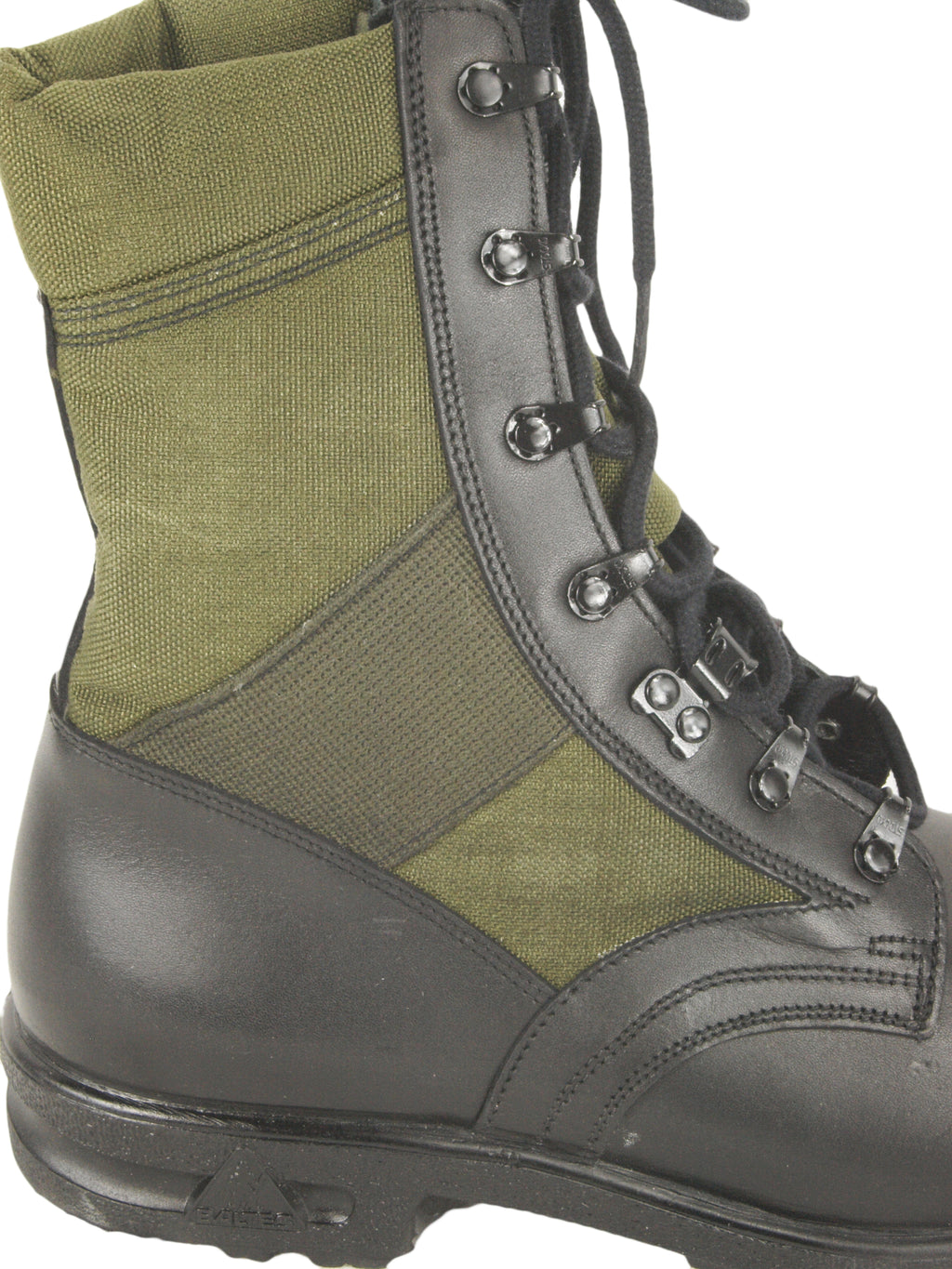 Close-up detail of the German jungle boot side panel displaying the high-quality stitching, durable olive canvas, and water egress port.