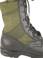 Close-up detail of the German jungle boot side panel displaying the high-quality stitching, durable olive canvas, and water egress port.