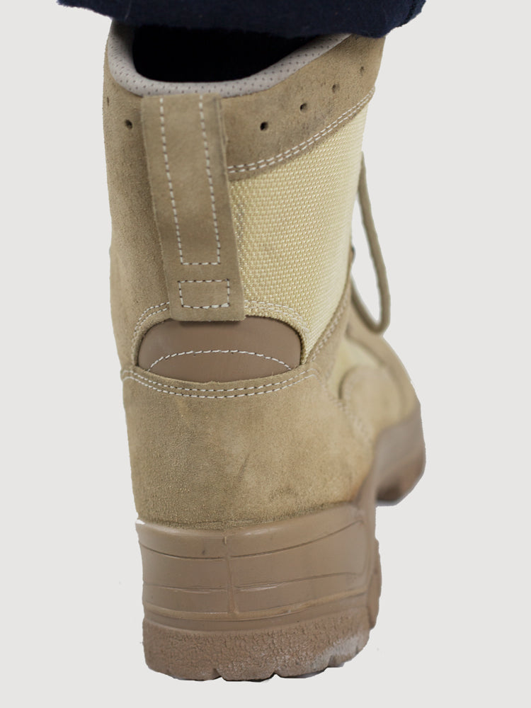 Rear view of a German Army unissued desert boot showing the reinforced heel structure and stitched pull tab for ankle support.