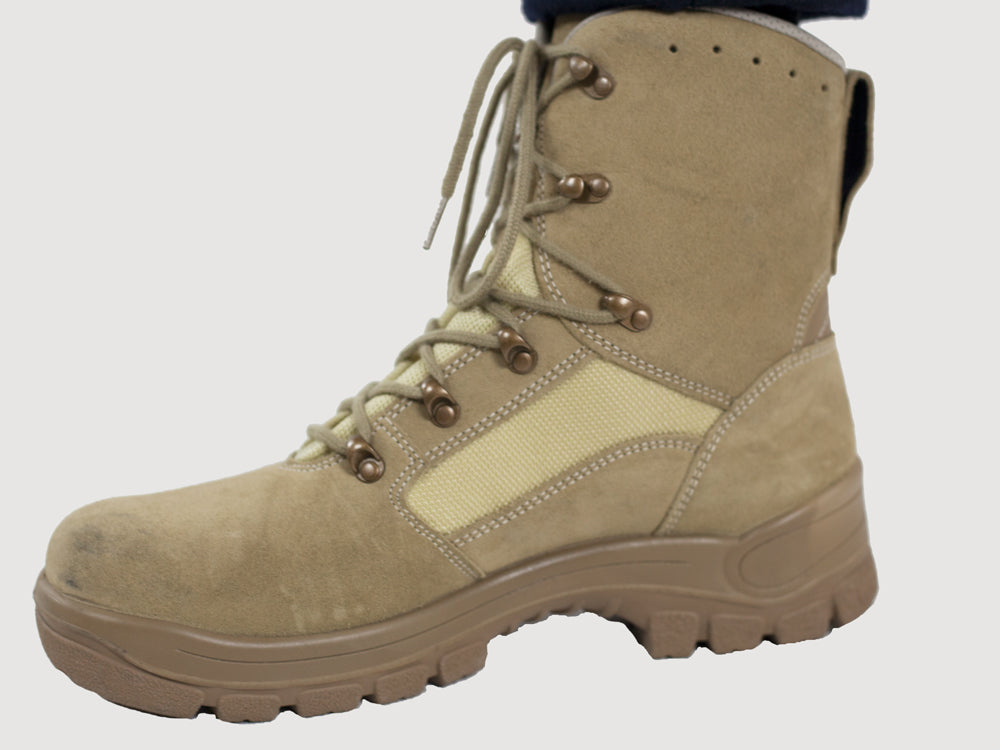 Side profile of a German Army desert boot featuring breathable suede, durable nylon panels, and secure metal lacing eyelets.