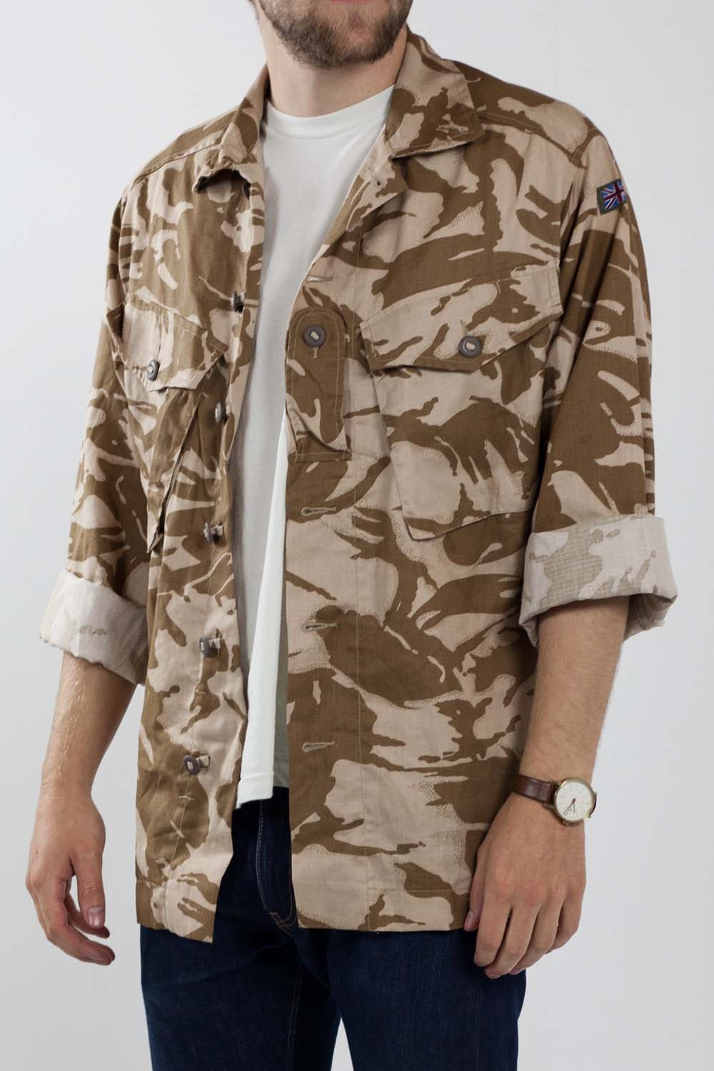 British desert combat shirt with sleeves rolled up, showing the internal fabric and Union Jack shoulder patch.
