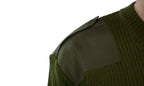 Close-up detail of the reinforced fabric shoulder epaulette on an olive green Italian Army military surplus wool jumper.