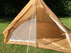 Side-on view into the interior of the military tent, showing the spacious two-person layout.