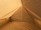 Interior close-up of the rear tent wall with a closed ventilation flap.