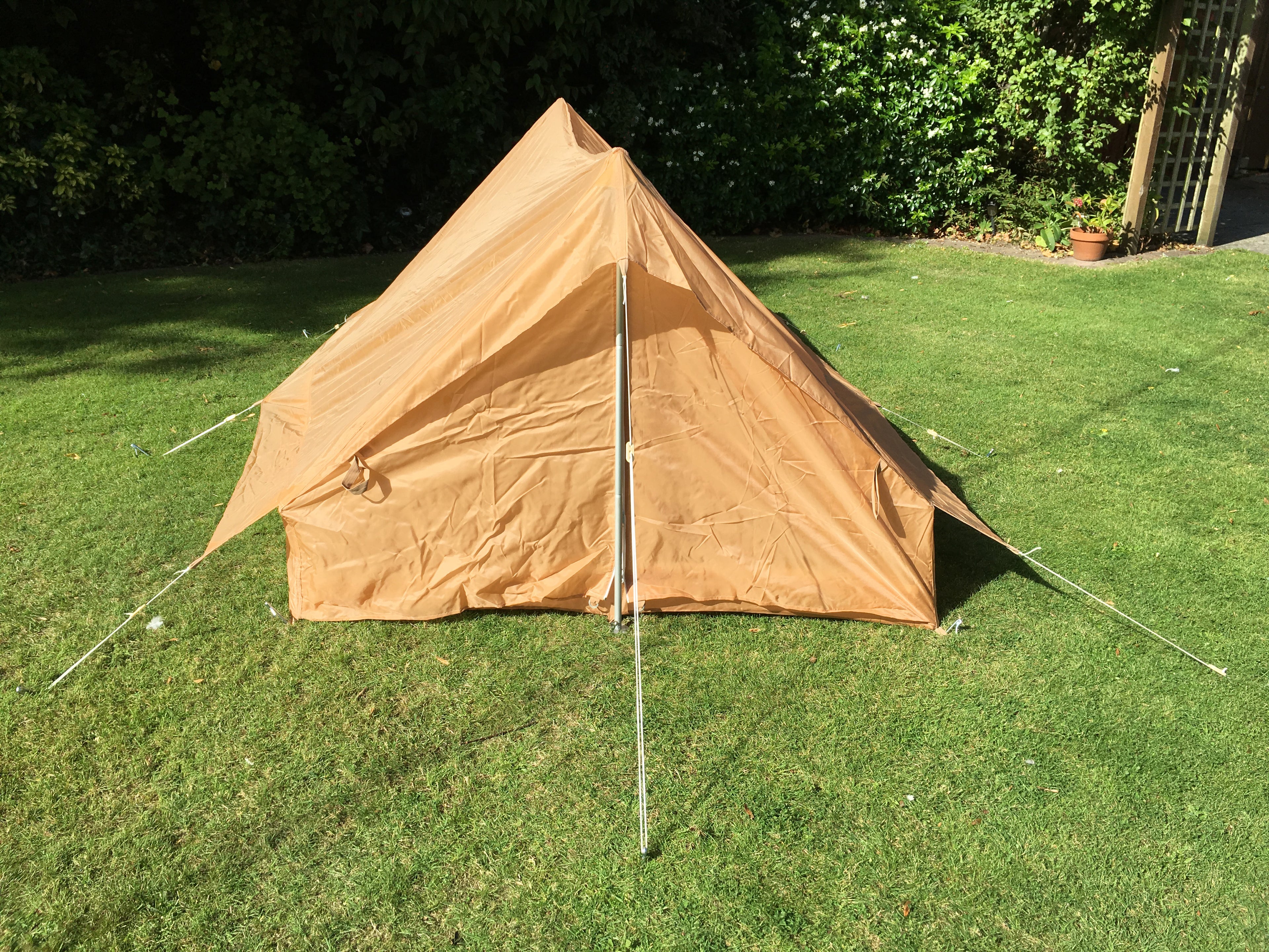 Side view of the French military nylon two-man tent, showing guy ropes and pole structure.