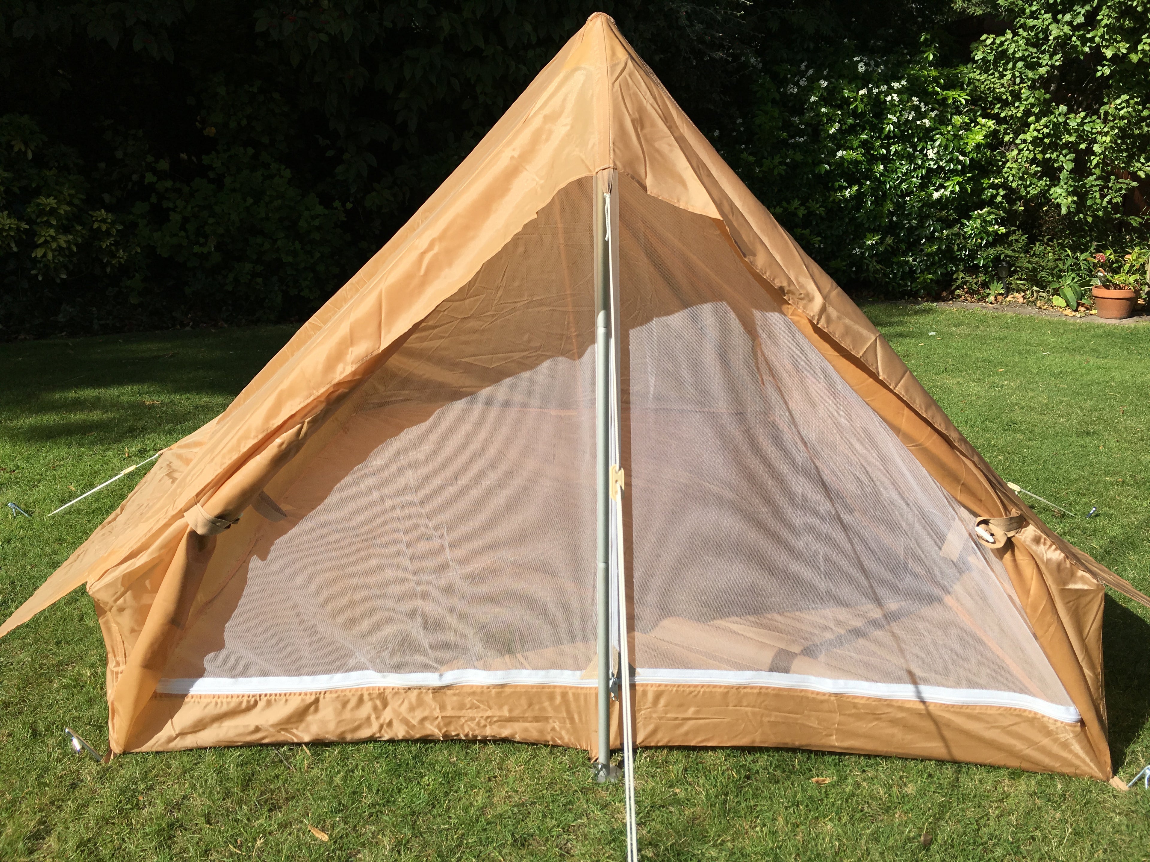 Close-up of the front entrance with mesh screen partially visible on the two-man tent.