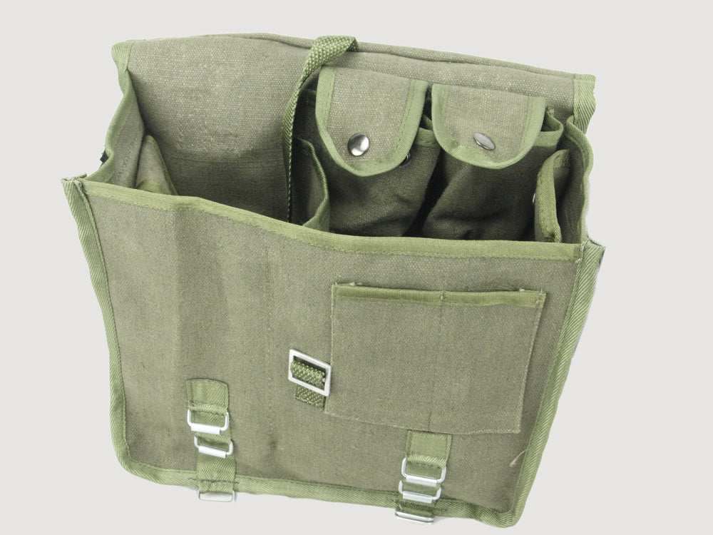 Open view of Polish Army canvas shoulder bag revealing multiple internal compartments, metal studs, and durable construction.