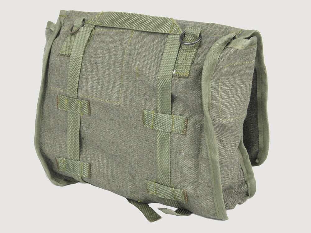 Rear view of original Polish Army canvas bag with reinforced webbing straps and metal D-rings for gear attachment.