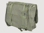 Rear view of original Polish Army canvas bag with reinforced webbing straps and metal D-rings for gear attachment.