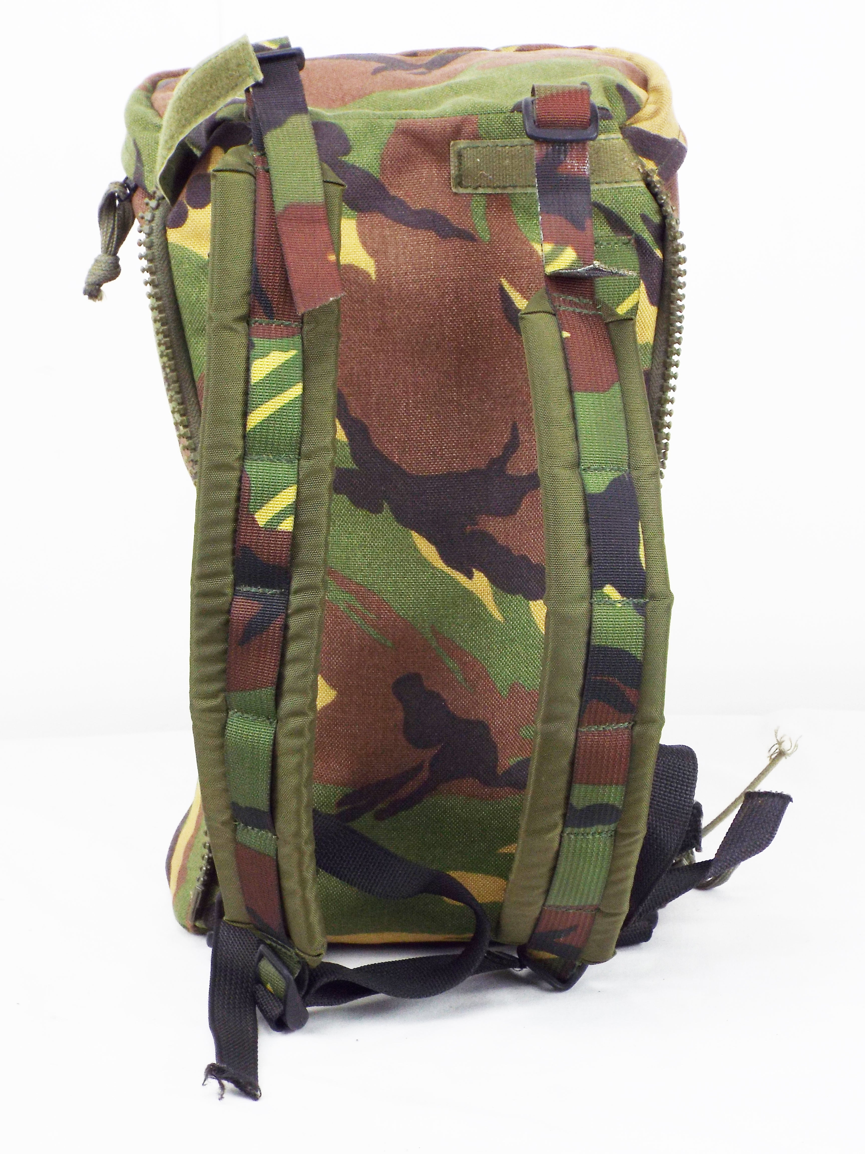 Rear view of a single Dutch Woodland camo side pocket featuring the bespoke shoulder strap setup for standalone use.