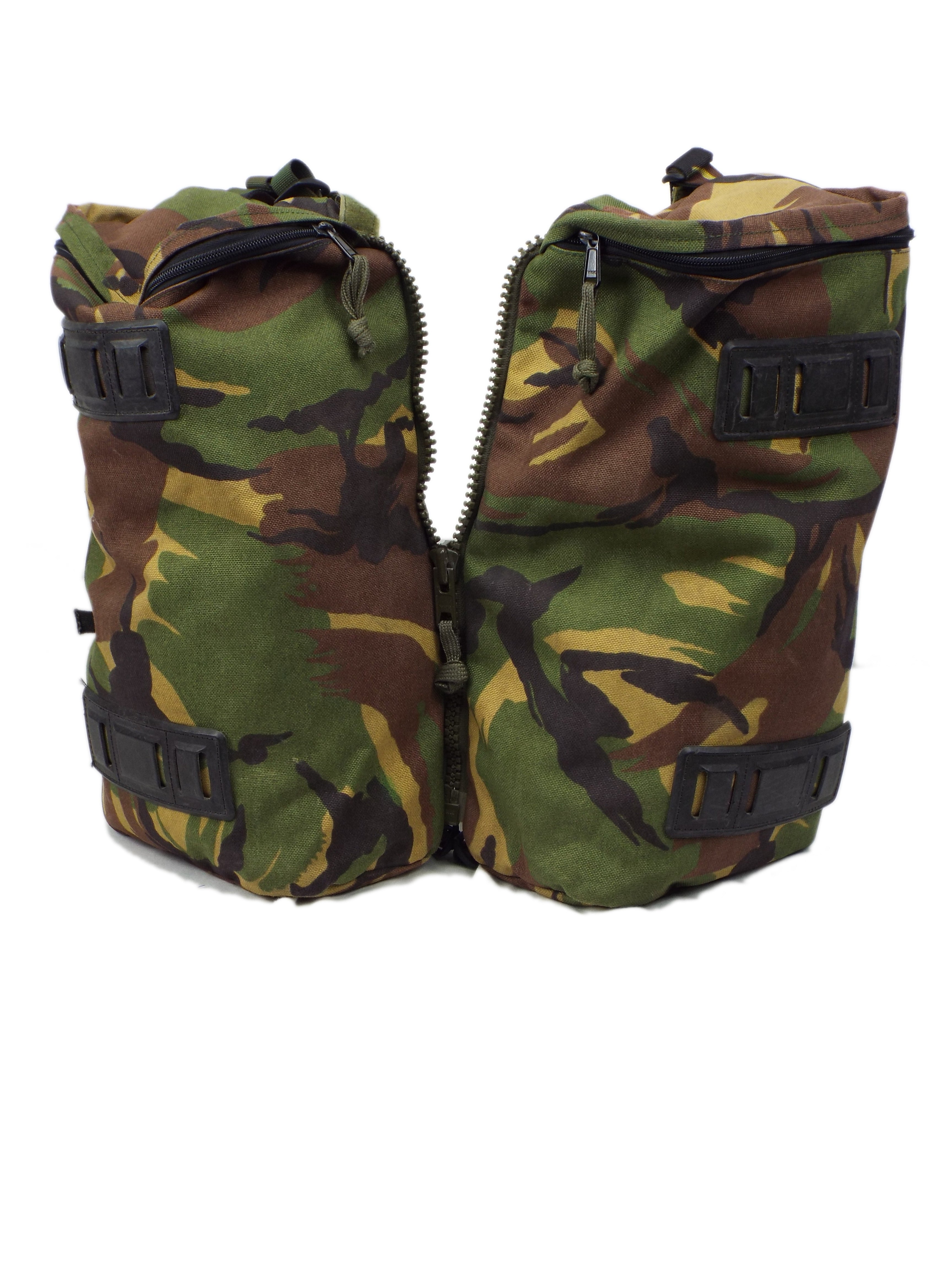 Close-up of the front of two connected Dutch military side pockets, highlighting the woodland camo pattern and zips.